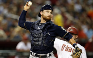 Jul 24, 2015; Phoenix, AZ, USA; Milwaukee Brewers catcher Jonathan Lucroy (20) turns the double play while avoiding Arizona Diamondbacks right fielder Ender Inciarte (5) in the third inning at Chase Field. Mandatory Credit: Rick Scuteri-USA TODAY Sports